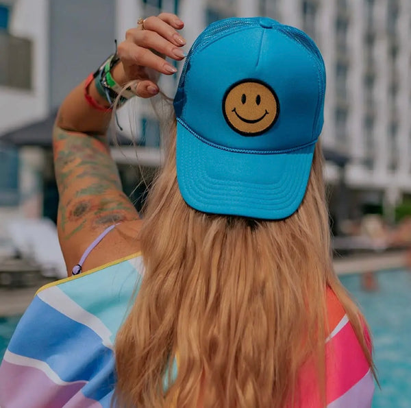 Blue smiley trucker cap